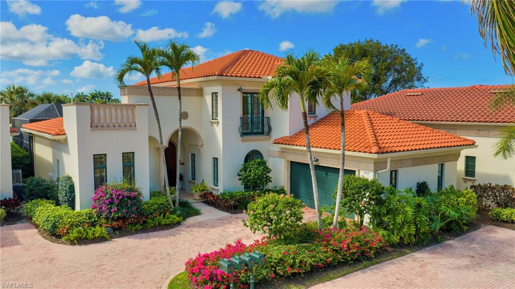 2629 Sorrel Way Naples, FL 34105 - Photo 3 of 43 a front view of a house with a yard