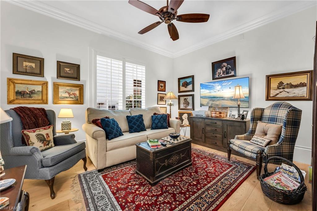 2629 Sorrel Way Naples, FL 34105 - Photo 32 of 43 a living room with furniture and a rug