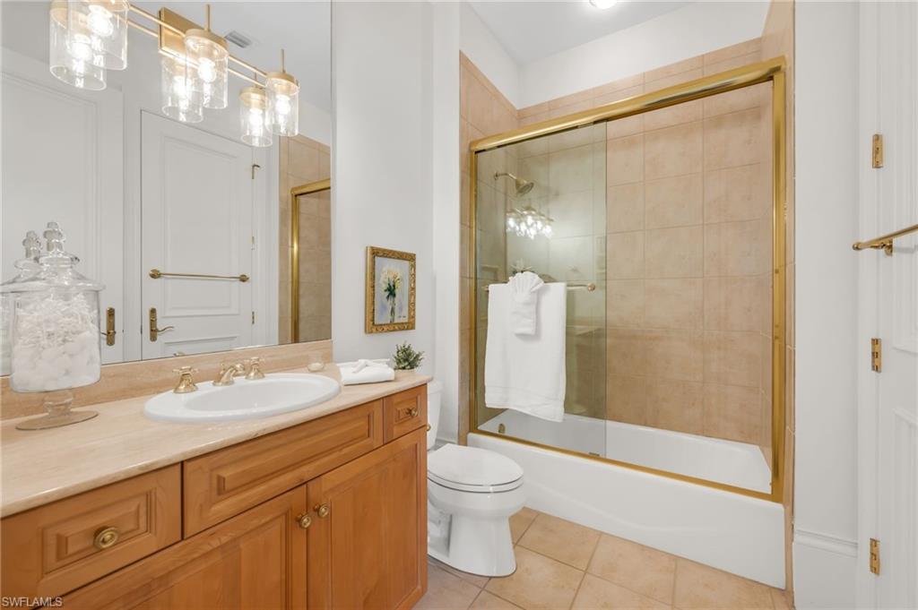 2629 Sorrel Way Naples, FL 34105 - Photo 34 of 43 a bathroom with a granite countertop sink toilet and shower