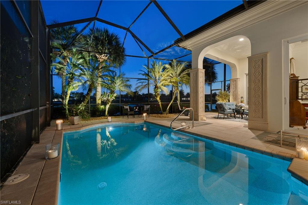 2629 Sorrel Way Naples, FL 34105 - Photo 41 of 43 a view of a swimming pool with a patio