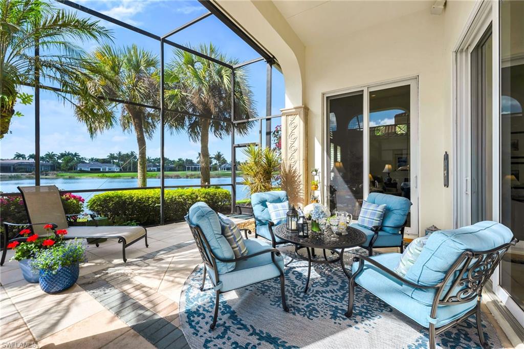 2629 Sorrel Way Naples, FL 34105 - Photo 5 of 43 a view of a patio with couches potted plants and swimming pool