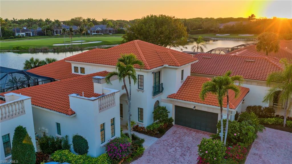 2629 Sorrel Way Naples, FL 34105 - Photo 8 of 43 a aerial view of a house next to a yard