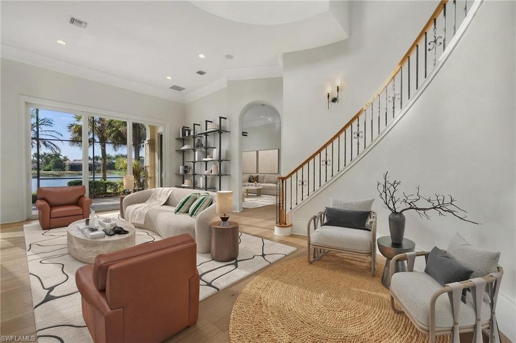 2629 Sorrel Way Naples, FL 34105 - Photo 10 of 43 a living room with furniture and a table
