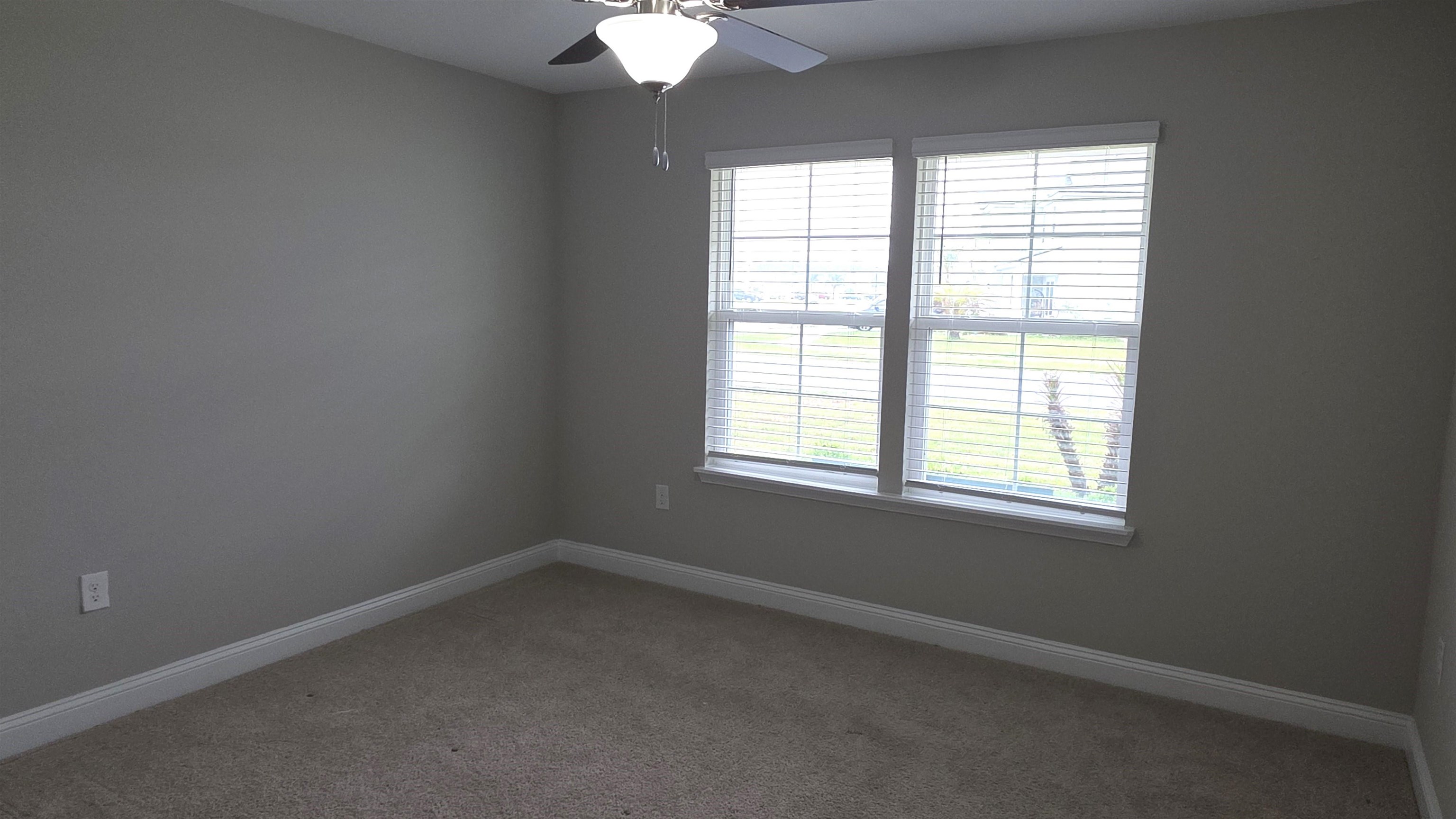 721 Navarez Street St. Augustine, FL 32084 - Photo 12 of 34 an empty room with a window