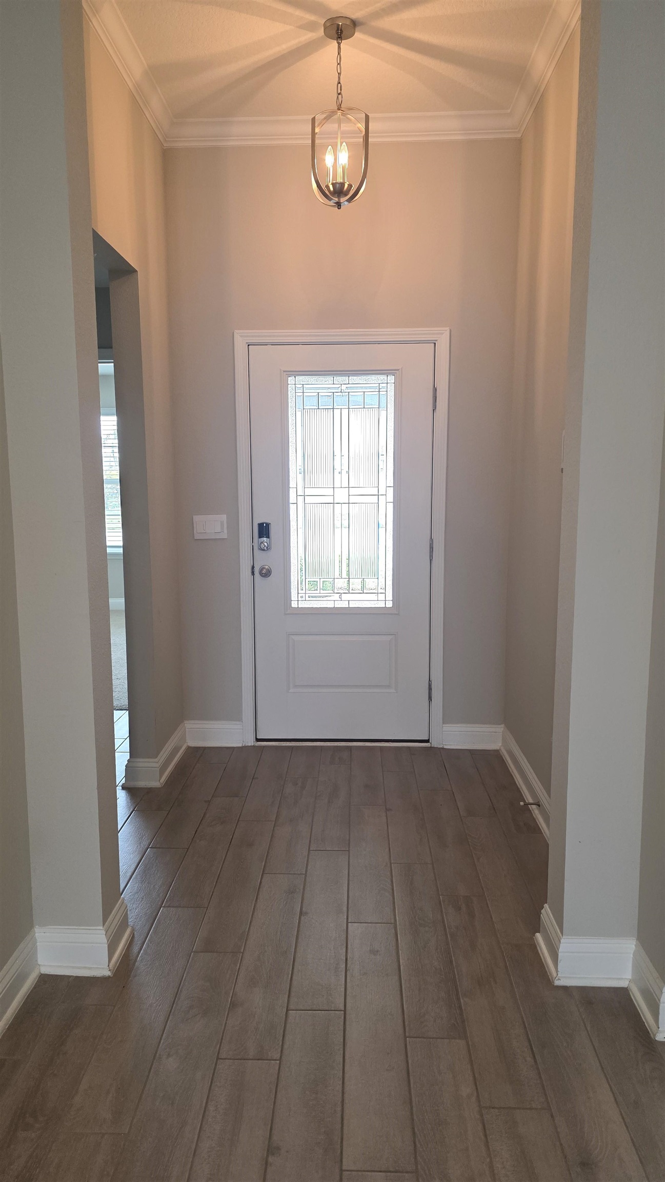 721 Navarez Street St. Augustine, FL 32084 - Photo 4 of 34 an empty room with wooden floor and windows