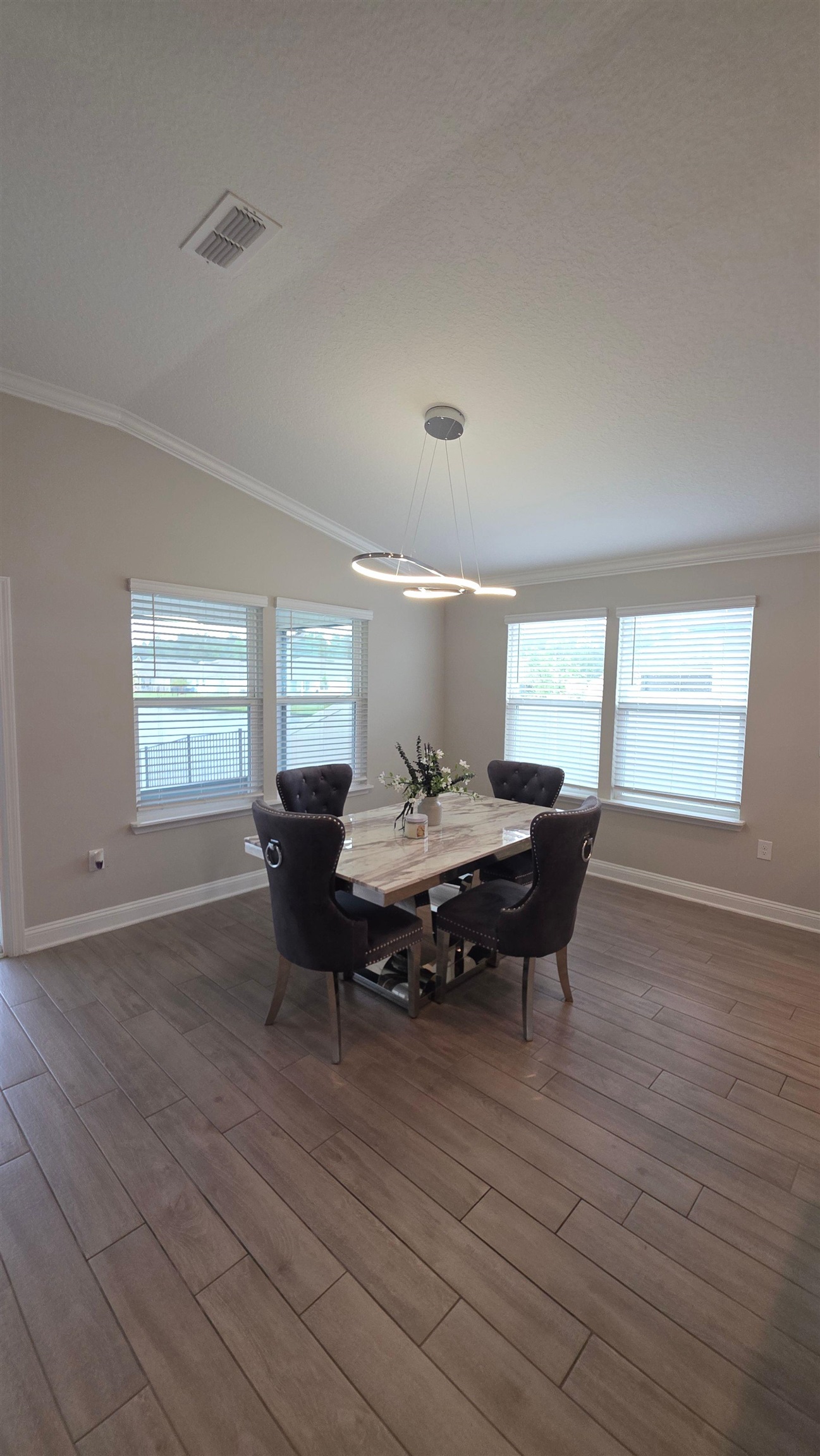 721 Navarez Street St. Augustine, FL 32084 - Photo 7 of 34 a living room with furniture and wooden floor