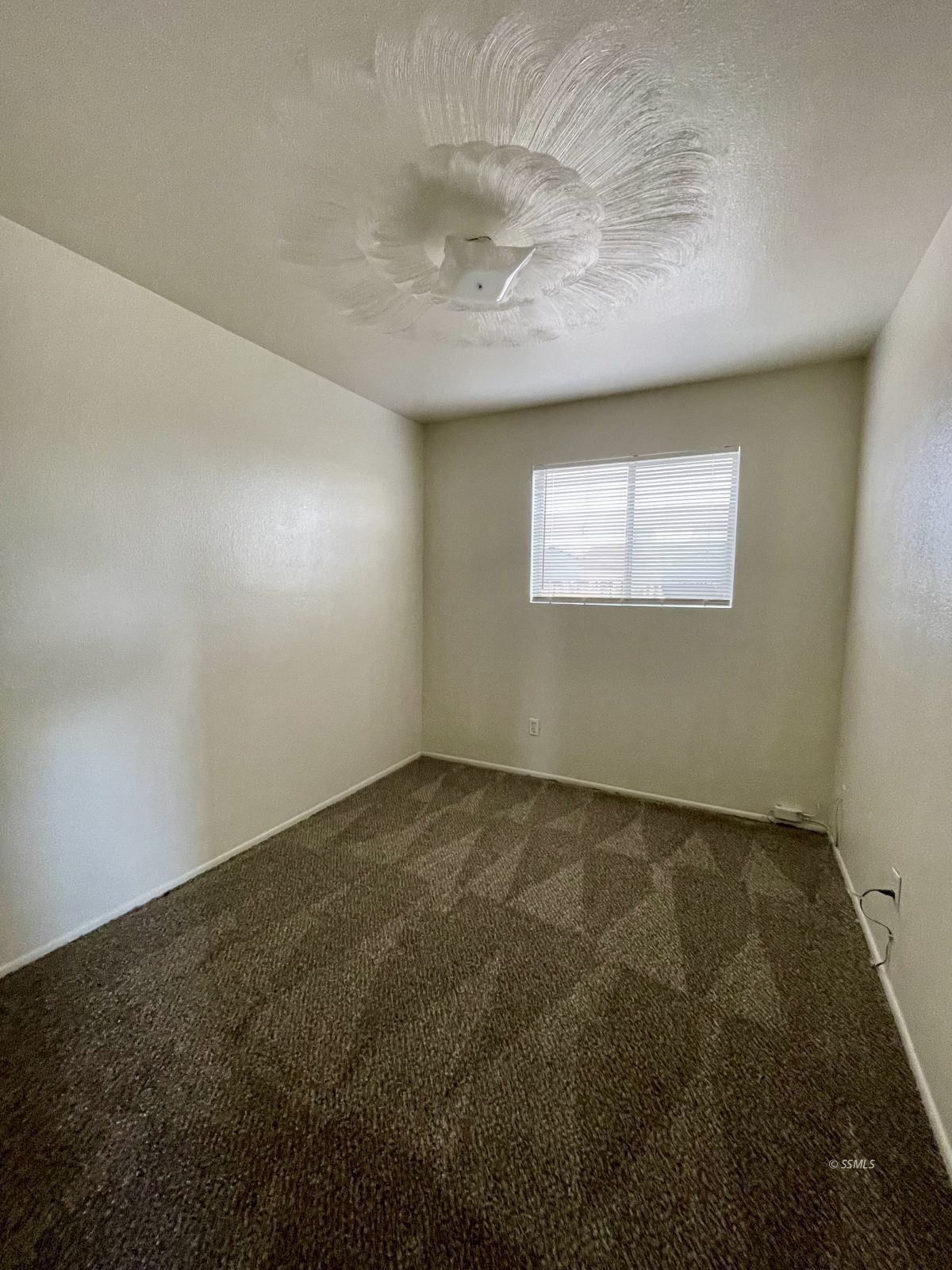 328 North Mono Street Ridgecrest, CA 93555 - Photo 2 of 14 an empty room with a empty space and windows