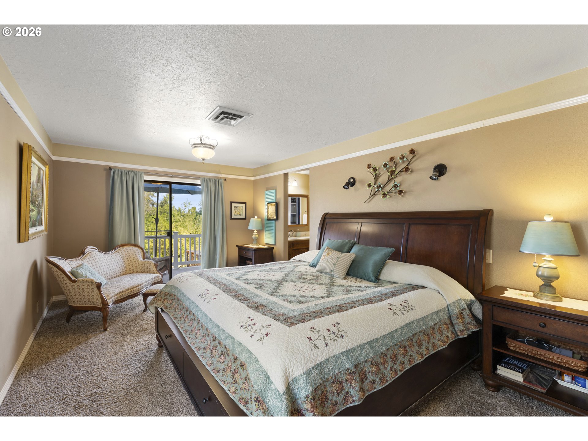 4515 Cordon Road Northeast Salem, OR 97305 - Photo 11 of 48 a bedroom with a large bed and wooden floor