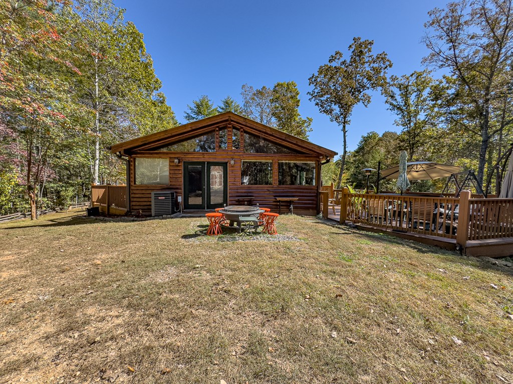 614 Rockridge Road Murphy, NC 28906 - Photo 15 of 43 a view of patio with a table and chairs under an umbrella