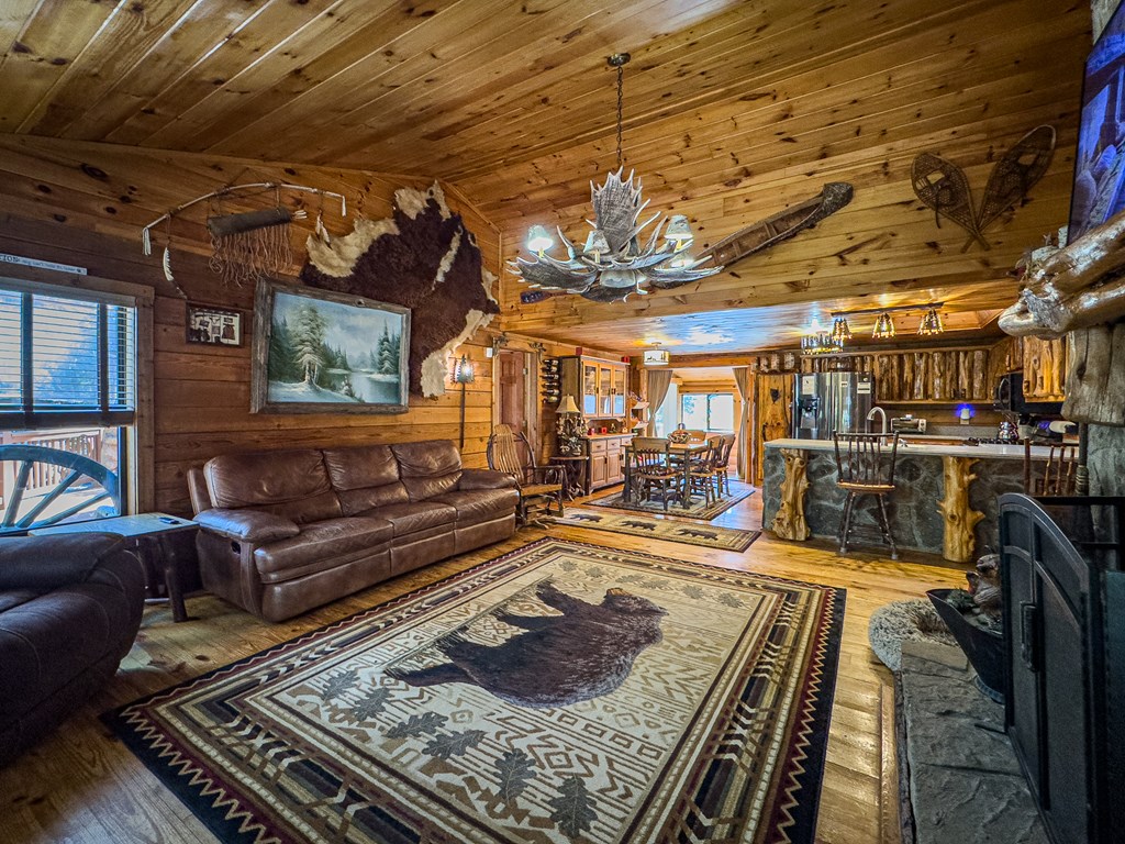 614 Rockridge Road Murphy, NC 28906 - Photo 27 of 43 a living room with lots of furniture and a rug