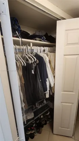 a bathroom with a sink mirror and vanity