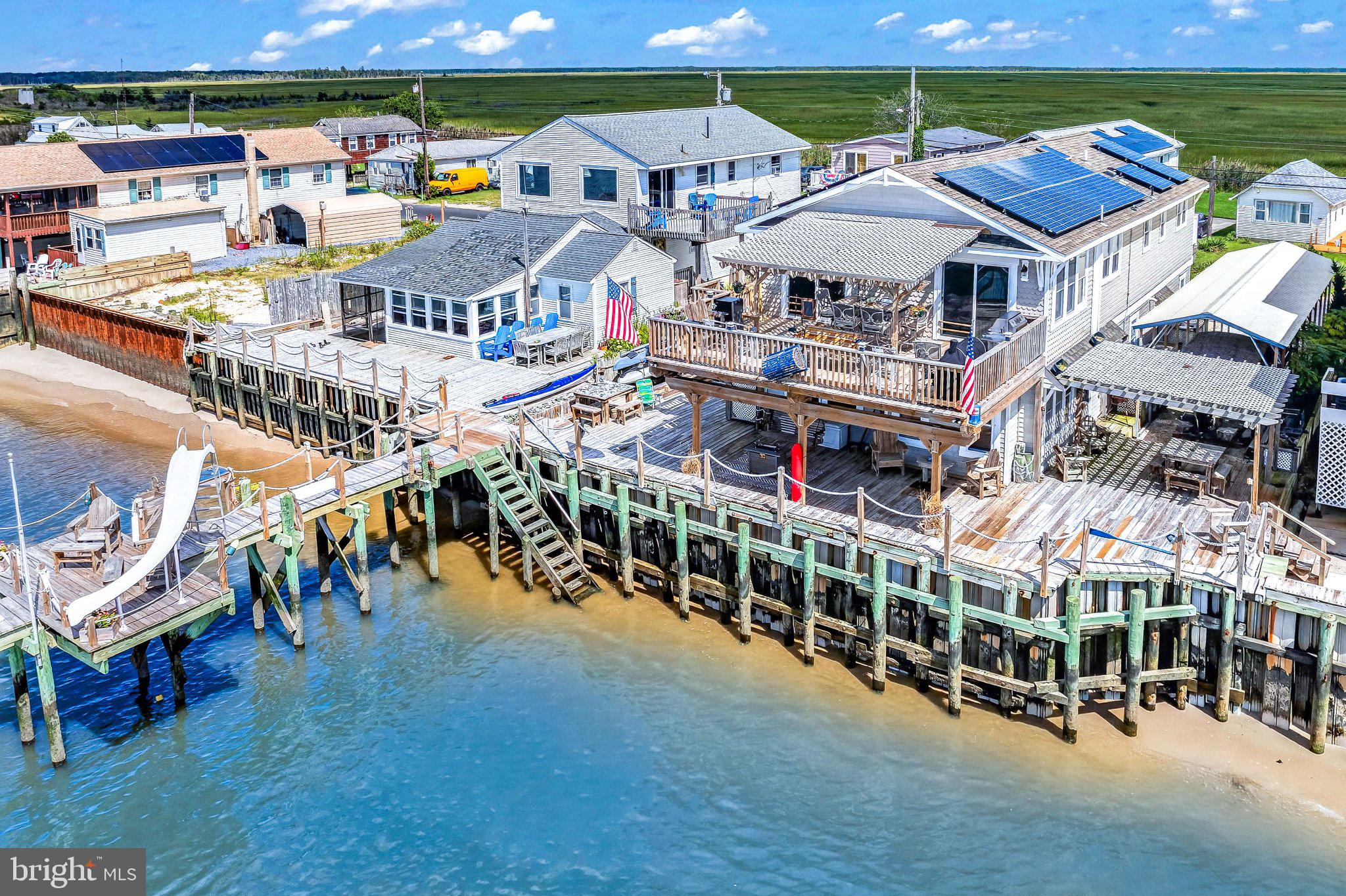314 New Jersey Avenue Fortescue, NJ 08321 - Photo 2 of 38 Decks & bulkhead, low tide sandy beach