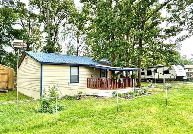 a house view with a garden space