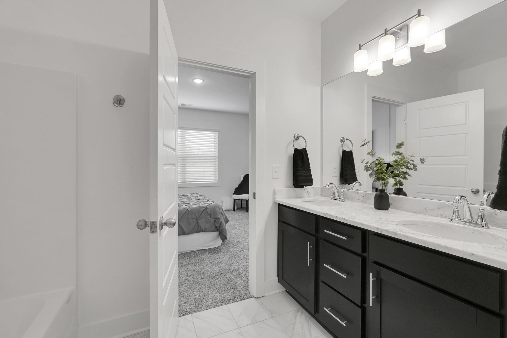 302 Carver Connection Lebanon, TN 37087 - Photo 13 of 43 a spacious bathroom with a double vanity sink mirror and next to a window