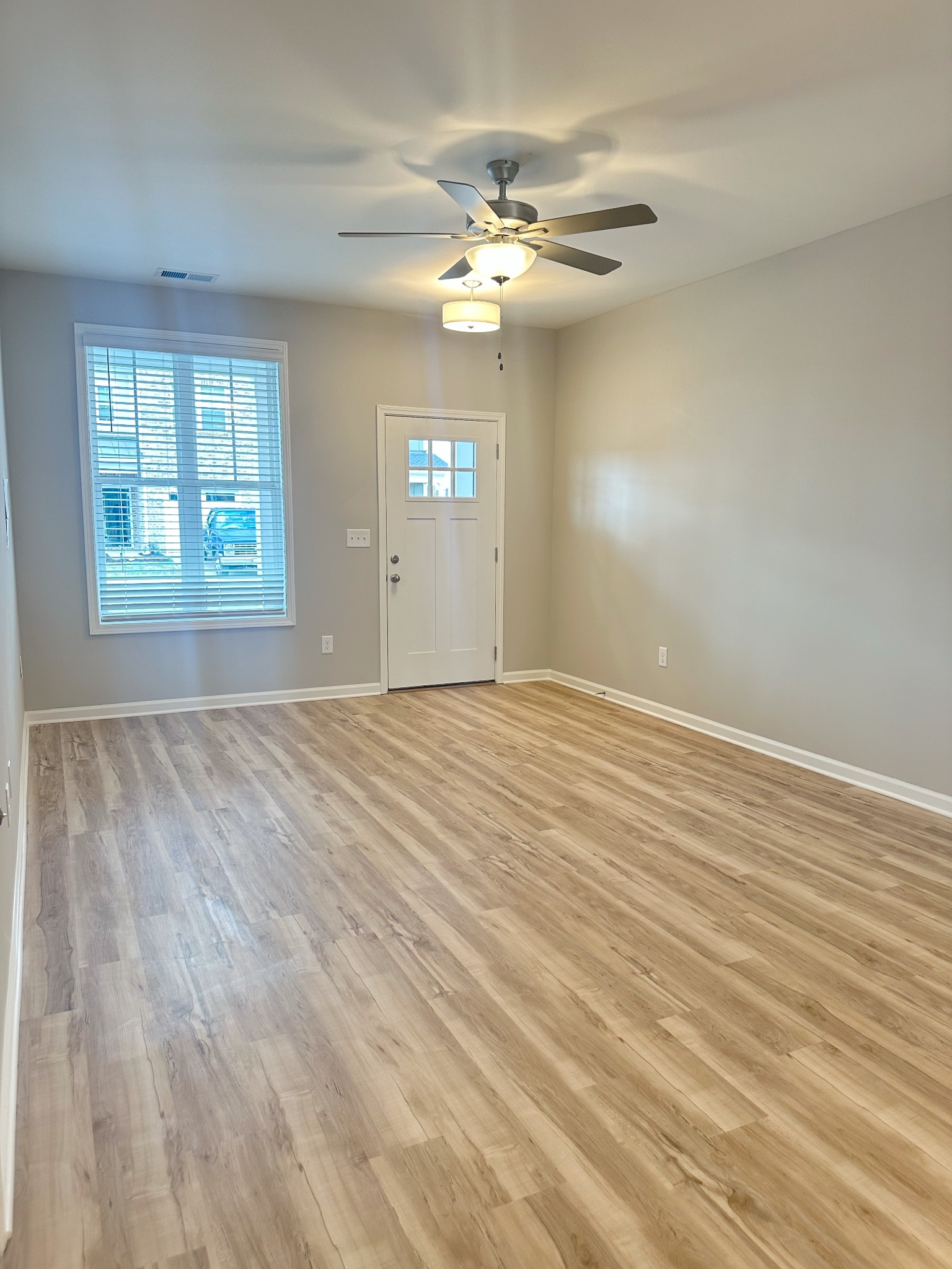 302 Carver Connection Lebanon, TN 37087 - Photo 29 of 43 a view of wooden floor and windows in a room
