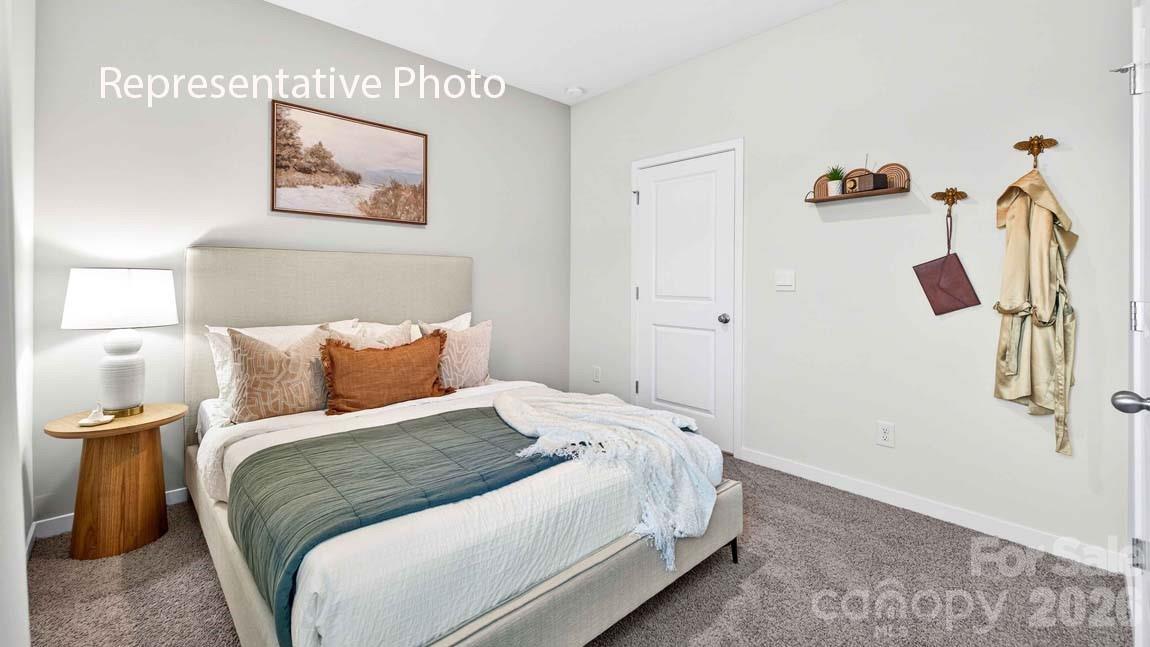 552 North Sparkleberry Street Chester, SC 29706 - Photo 19 of 28 a bedroom with a bed and a painting on the wall