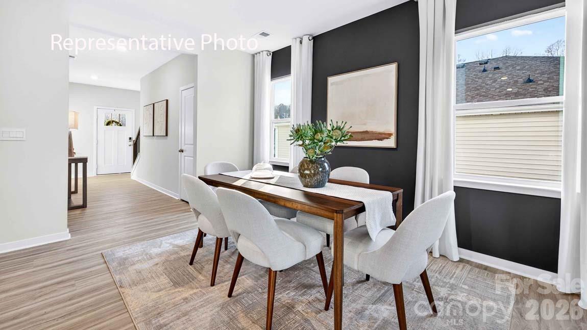 552 North Sparkleberry Street Chester, SC 29706 - Photo 6 of 28 a dining room with furniture and wooden floor