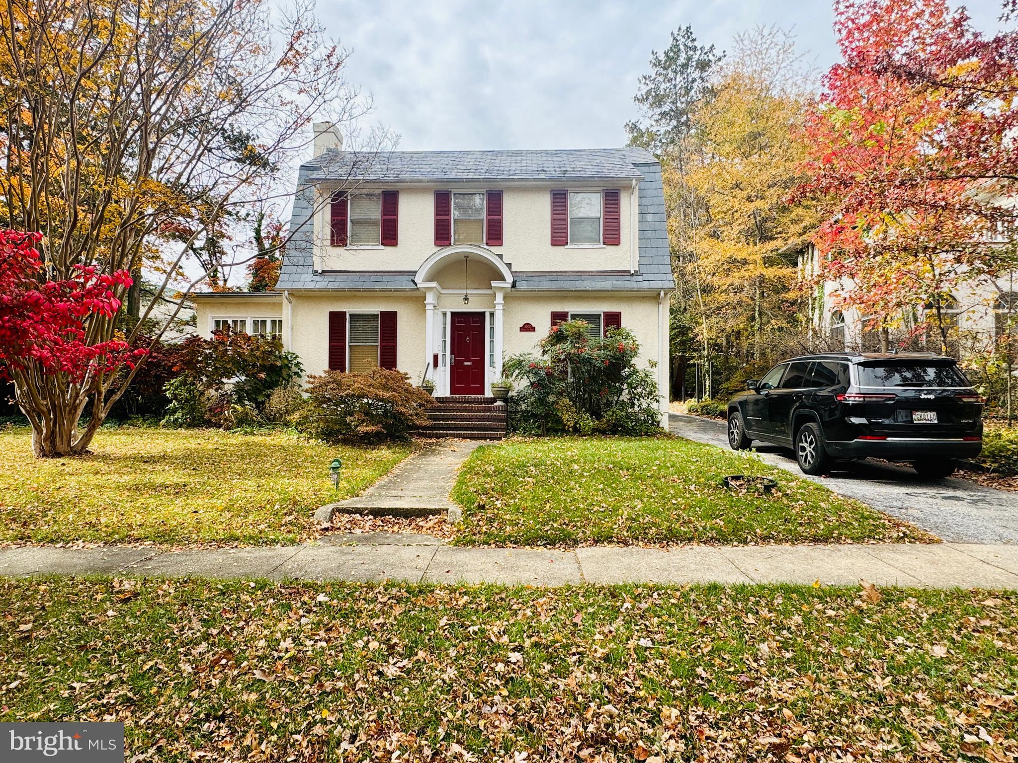 3902 Hadley Square West Baltimore, MD 21218 - Photo 2 of 38 a front view of a house with a yard
