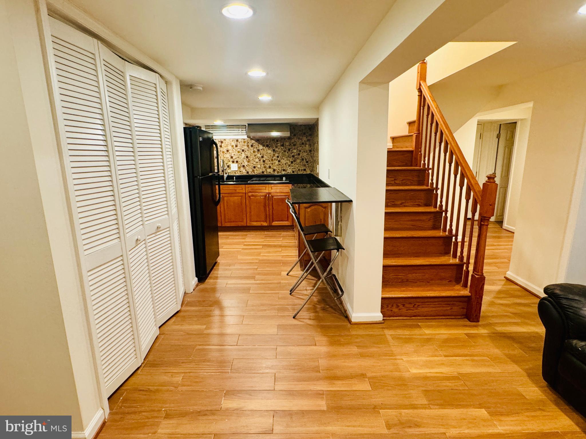 3902 Hadley Square West Baltimore, MD 21218 - Photo 26 of 38 a view of entryway with wooden floor