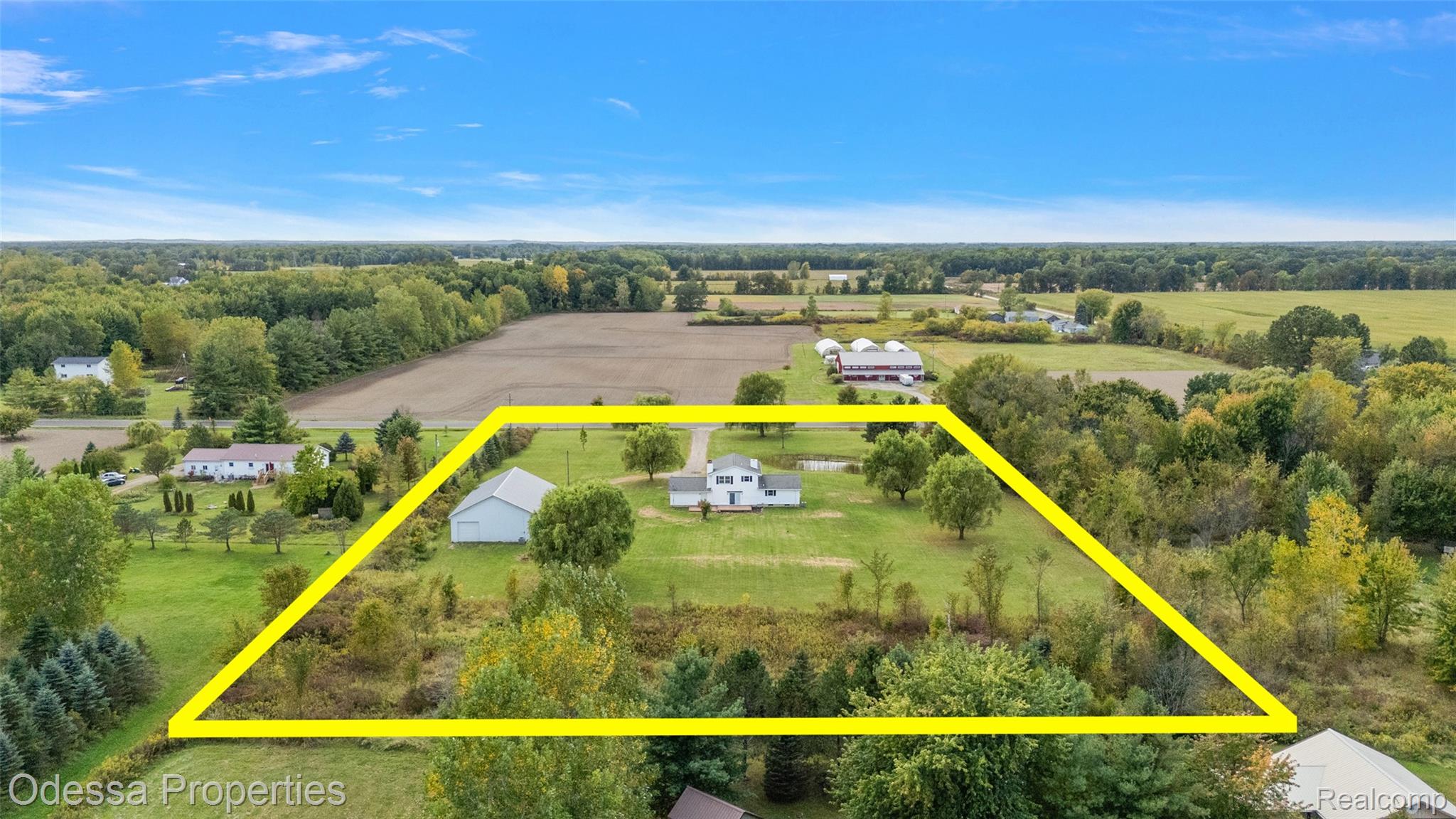1442 Riley Center Road Memphis, MI 48041 - Photo 51 of 62 Overview of rural landscape with property parcel outlined and a tree filled landscape