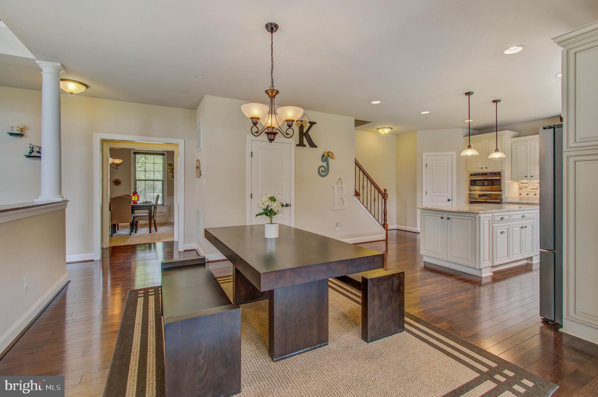 3188 Huntsman Drive Huntingtown, MD 20639 - Photo 13 of 98 a room with lots of furniture and wooden floor