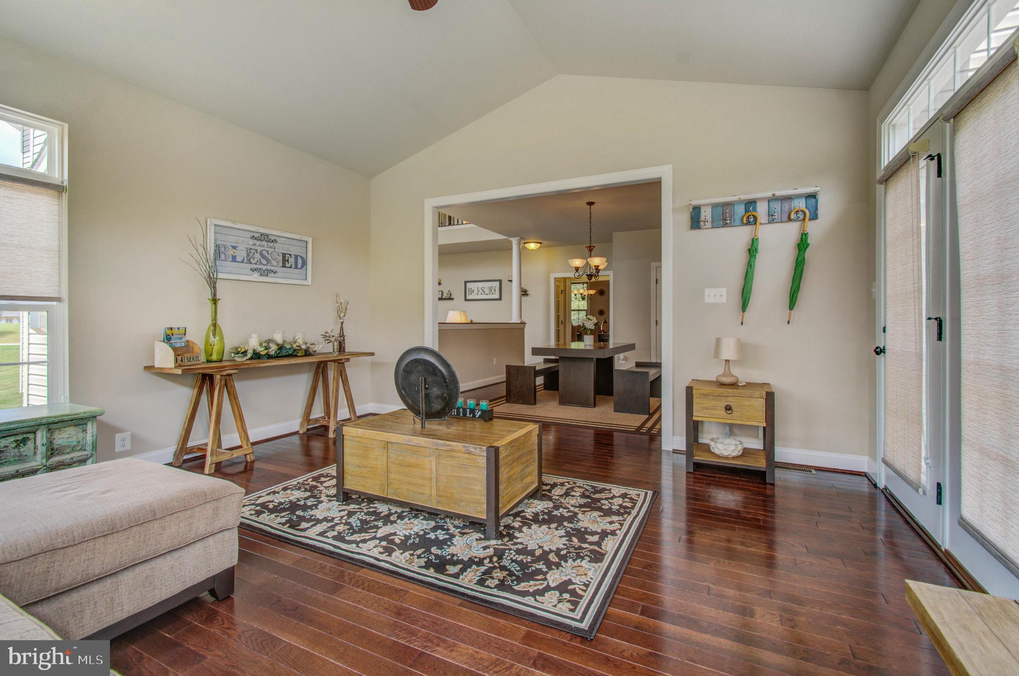 3188 Huntsman Drive Huntingtown, MD 20639 - Photo 22 of 98 a living room with furniture and a wooden floor