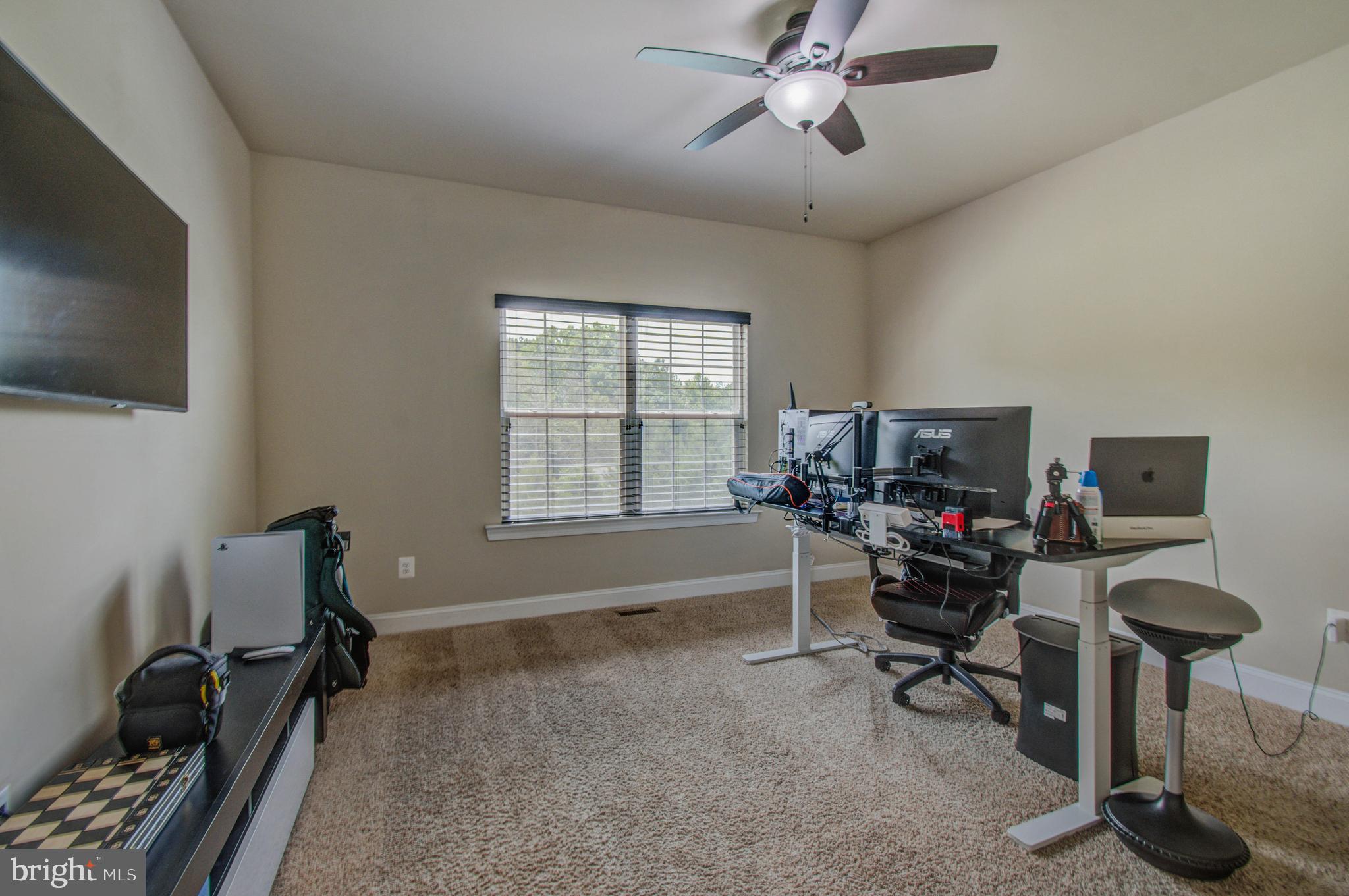 3188 Huntsman Drive Huntingtown, MD 20639 - Photo 28 of 98 a view of a workspace with furniture and a window