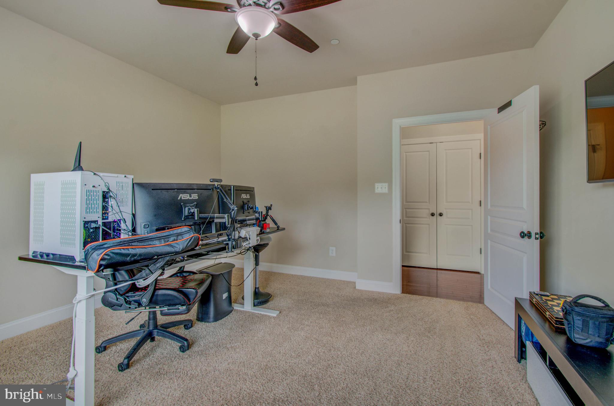 3188 Huntsman Drive Huntingtown, MD 20639 - Photo 29 of 98 a view of a workspace with furniture and a window