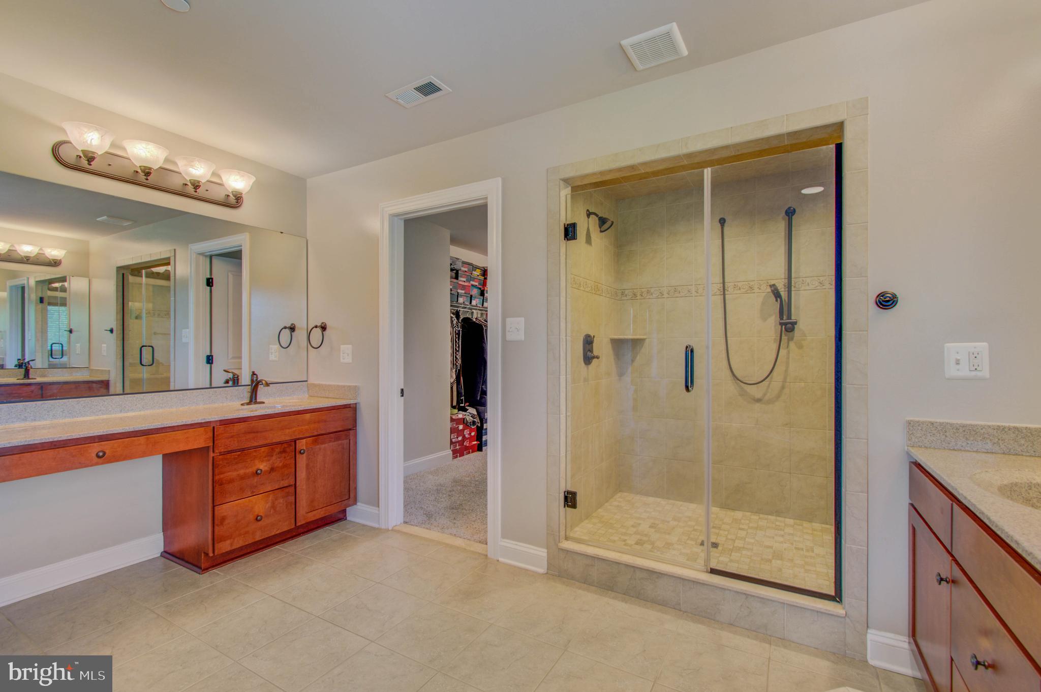 3188 Huntsman Drive Huntingtown, MD 20639 - Photo 38 of 98 a large spacious bathroom with a shower and a sink