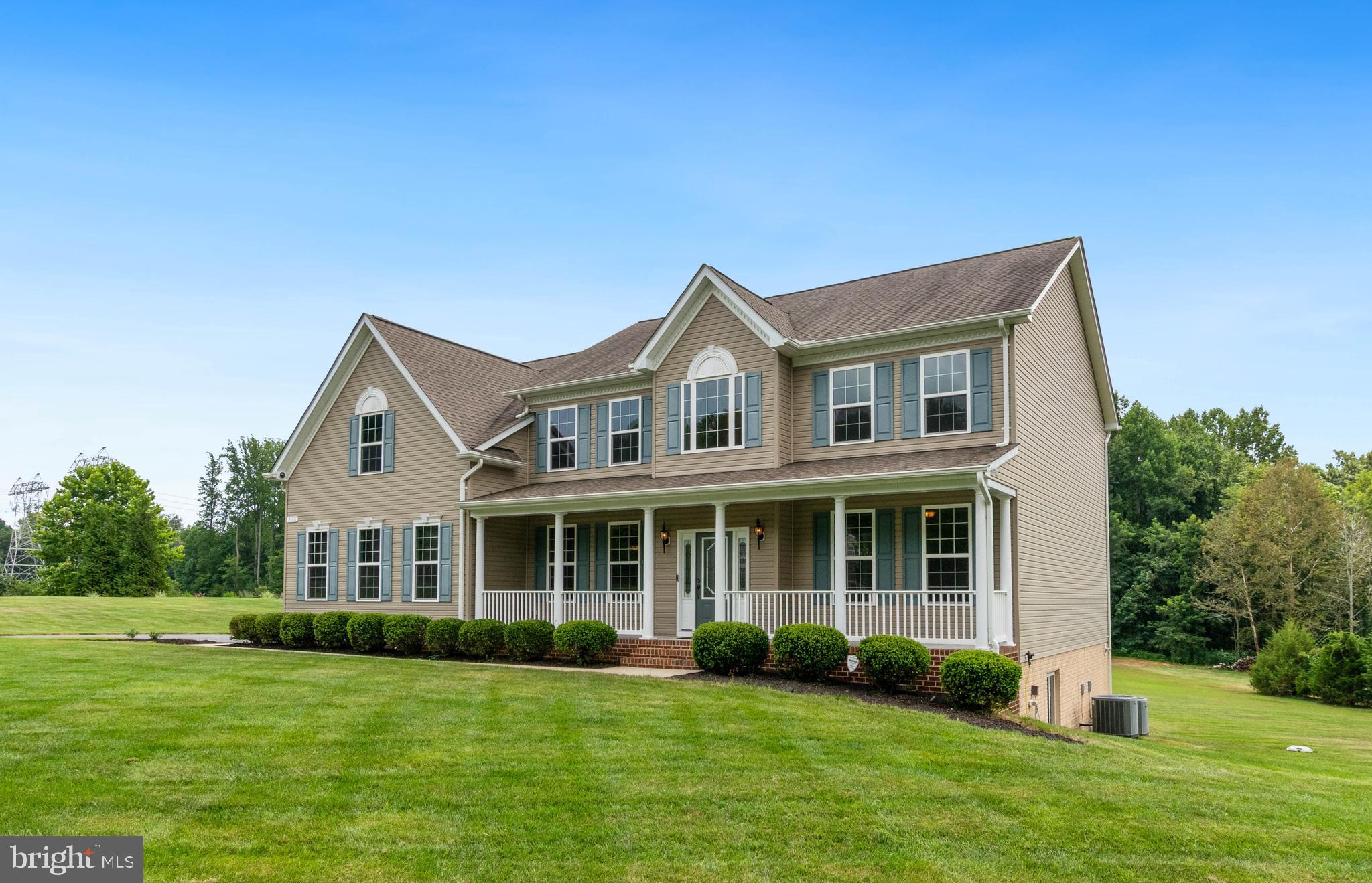 3188 Huntsman Drive Huntingtown, MD 20639 - Photo 4 of 98 a front view of a house with a yard
