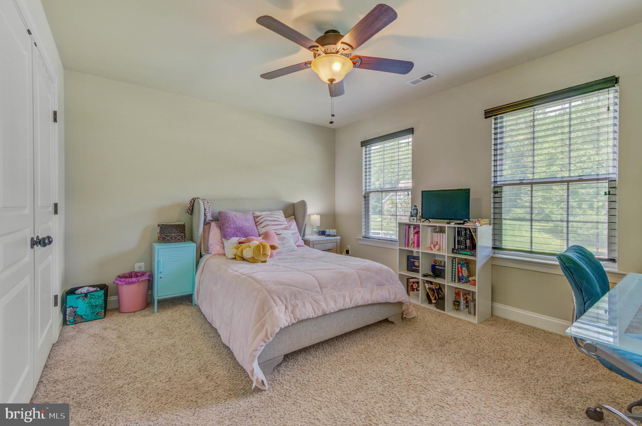 3188 Huntsman Drive Huntingtown, MD 20639 - Photo 43 of 98 a bedroom with a bed furniture and a flat tv screen