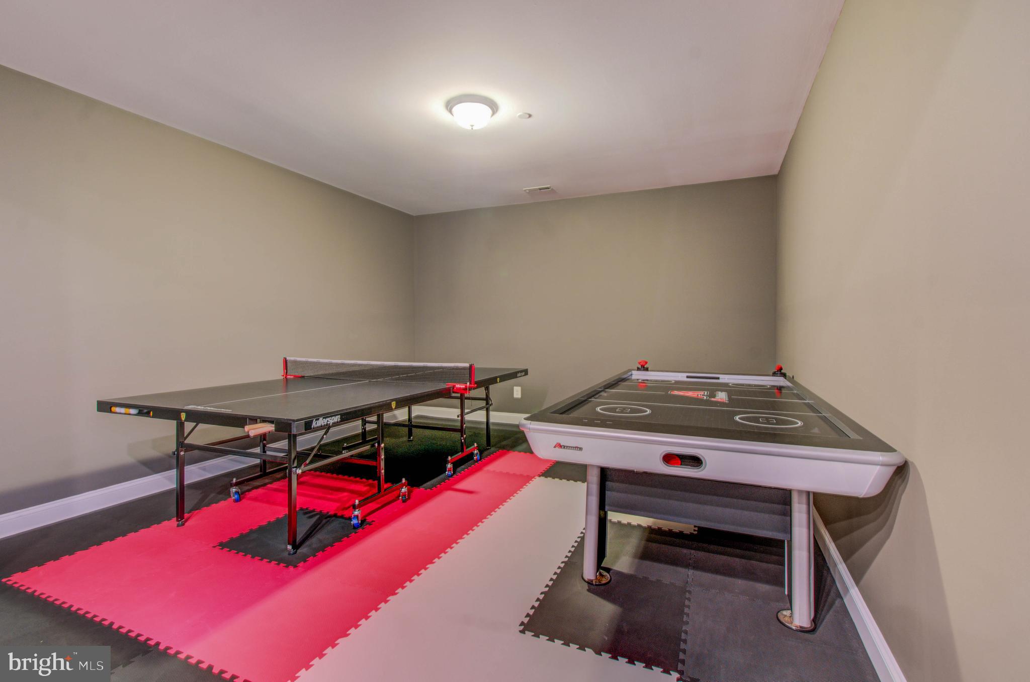 3188 Huntsman Drive Huntingtown, MD 20639 - Photo 61 of 98 a room with furniture and air hockey table