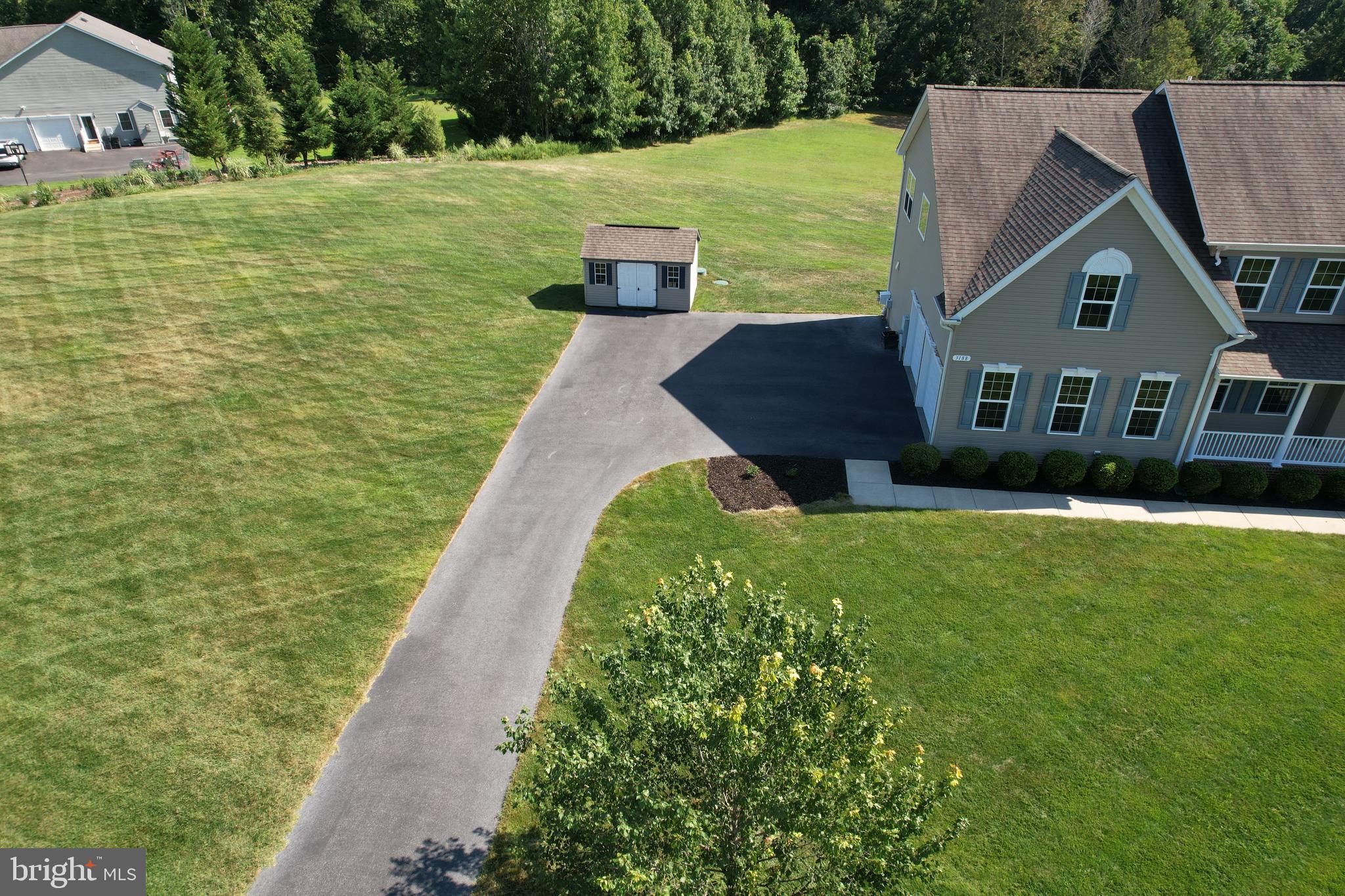 3188 Huntsman Drive Huntingtown, MD 20639 - Photo 7 of 98 a front view of a house with a yard