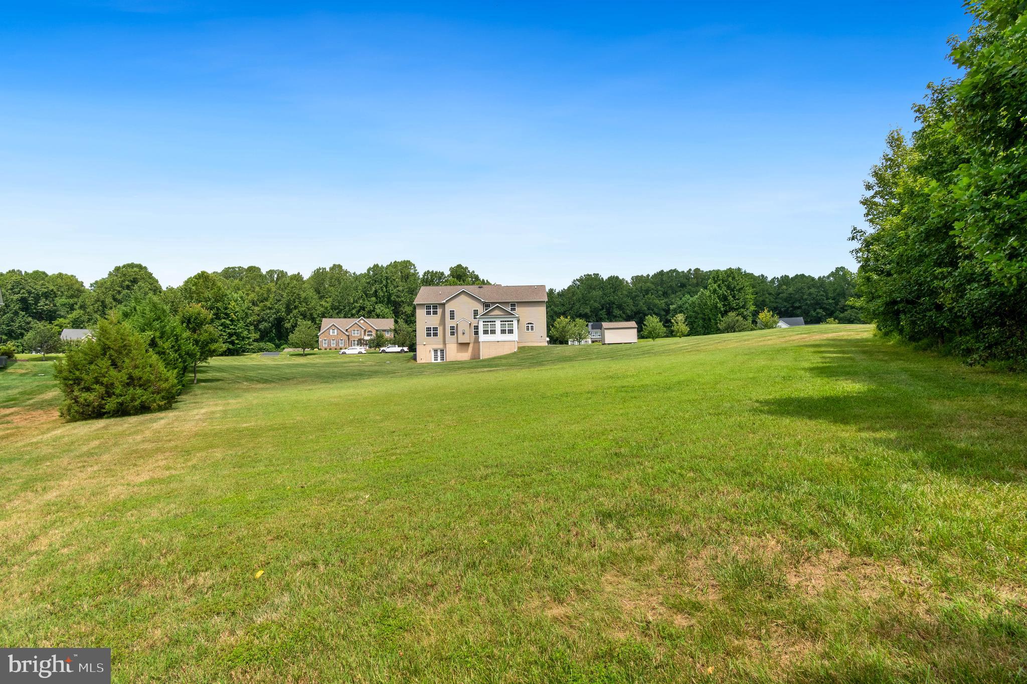 3188 Huntsman Drive Huntingtown, MD 20639 - Photo 74 of 98 a view of a field with an trees in the background