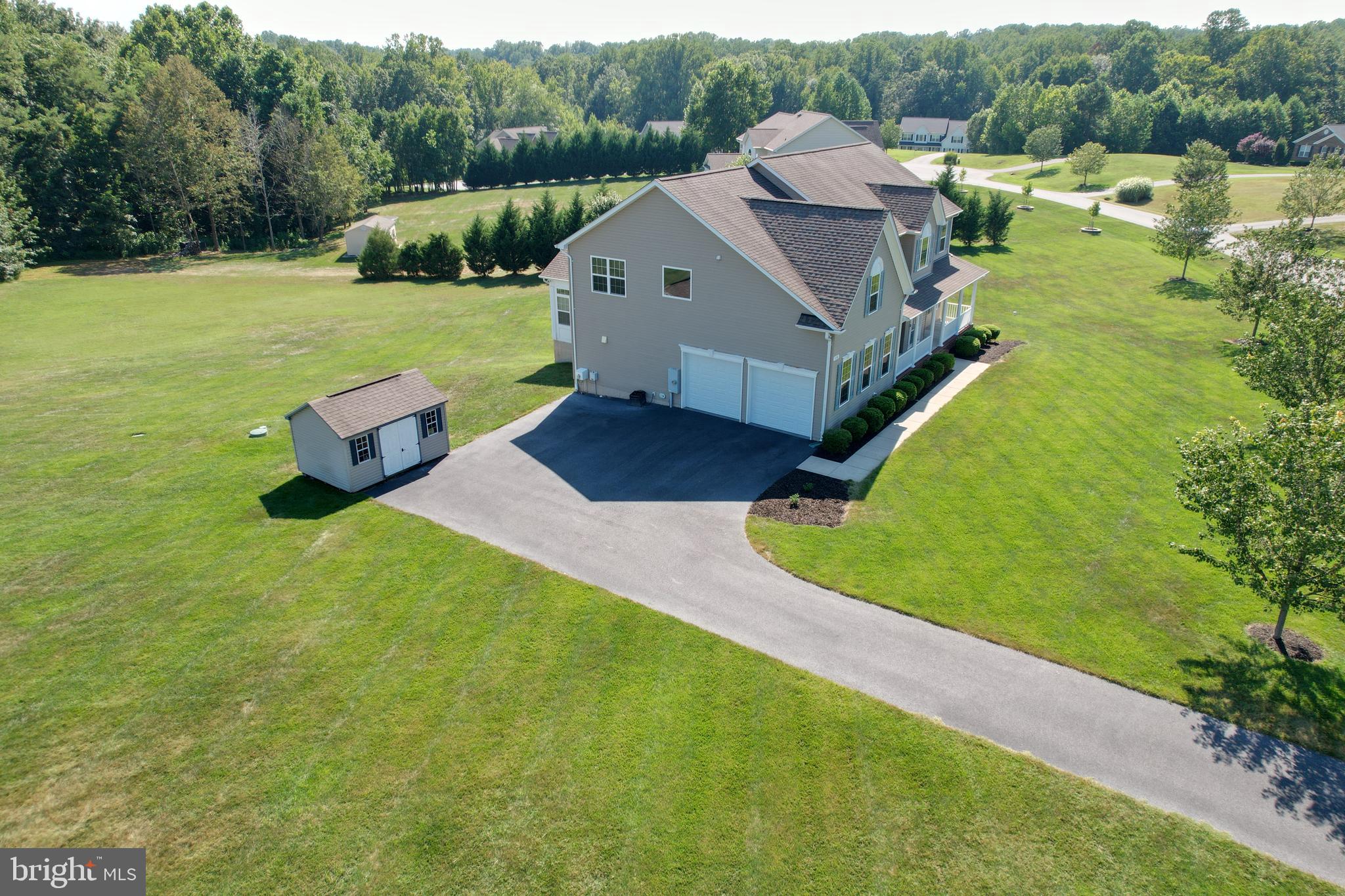 3188 Huntsman Drive Huntingtown, MD 20639 - Photo 8 of 98 a aerial view of a house with swimming pool garden and patio