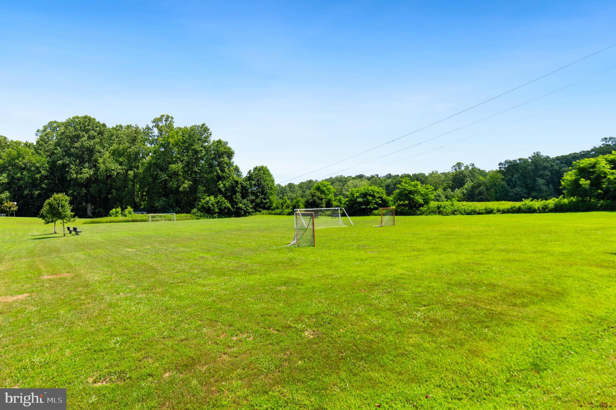 3188 Huntsman Drive Huntingtown, MD 20639 - Photo 82 of 98 a view of a green field with wooden fence
