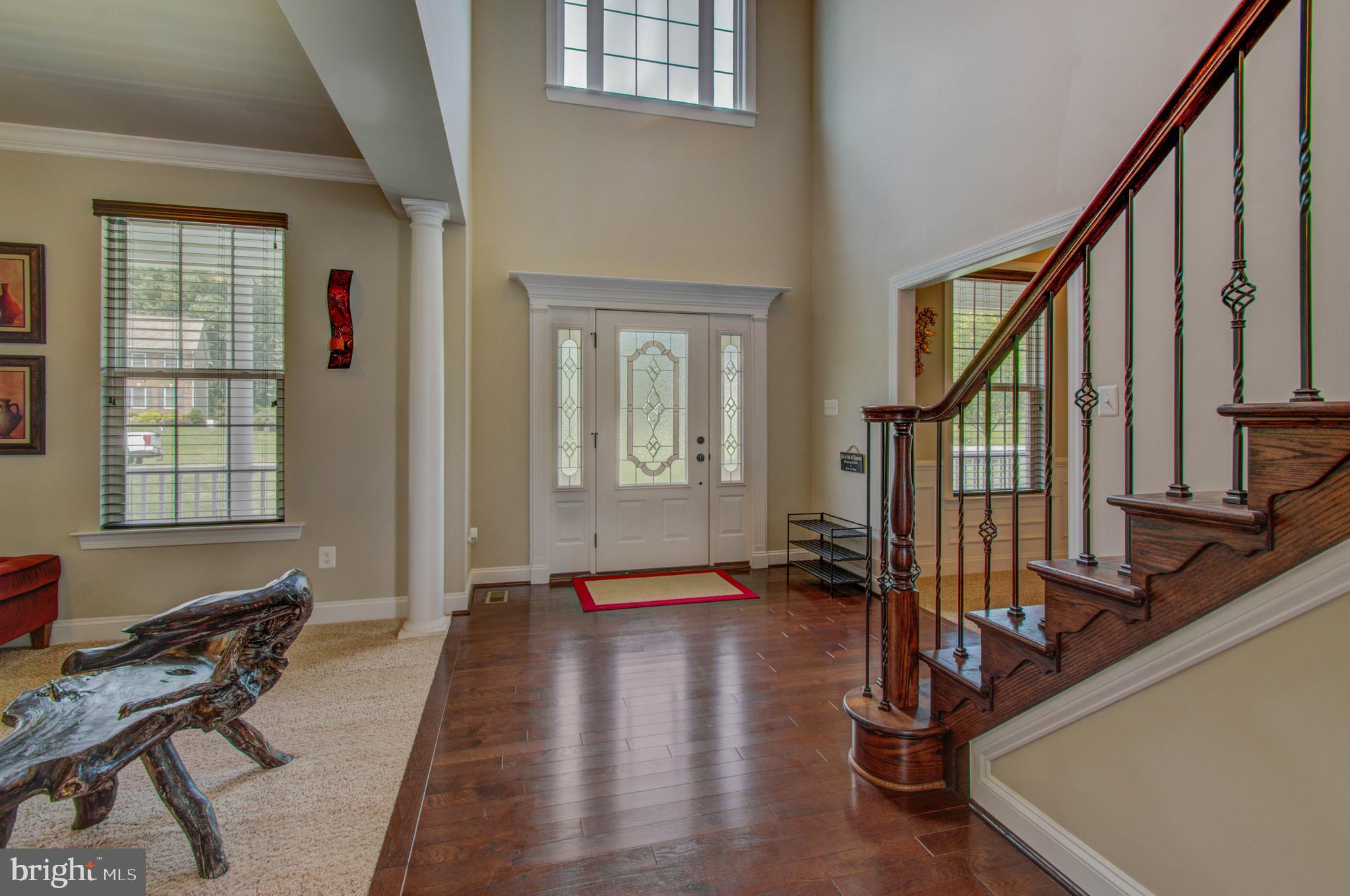 3188 Huntsman Drive Huntingtown, MD 20639 - Photo 9 of 98 a view of an entryway with wooden floor and a window
