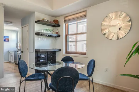 a view of a livingroom with furniture and a fireplace