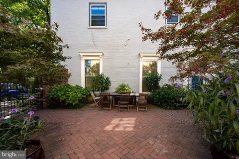 a front view of a building with street view