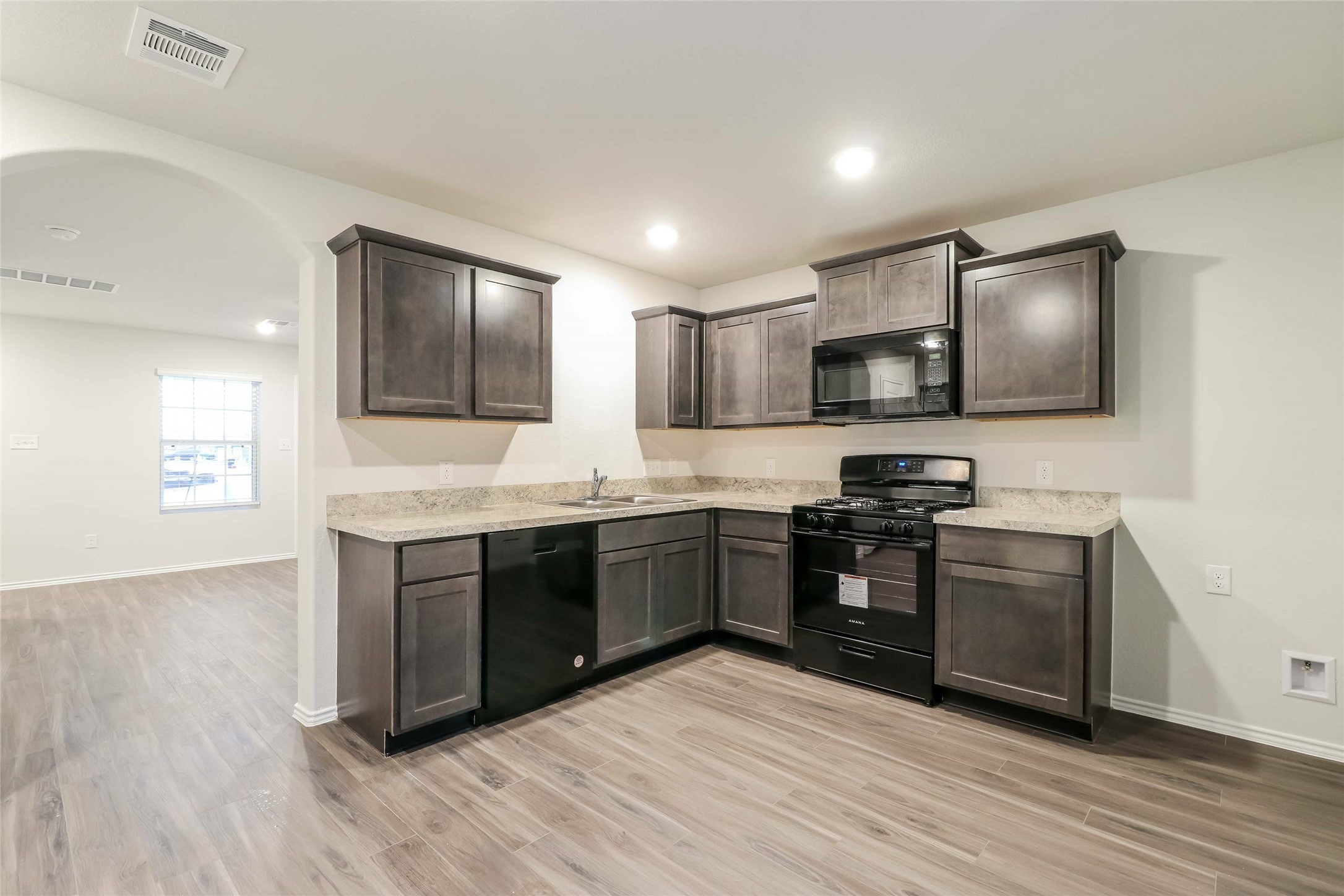 2437 Carp Drive Conroe, TX 77384 - Photo 7 of 17 Photos may be representative of the floor plan and not the exact home. Finishes, layout, and features of the actual property for lease may vary.
