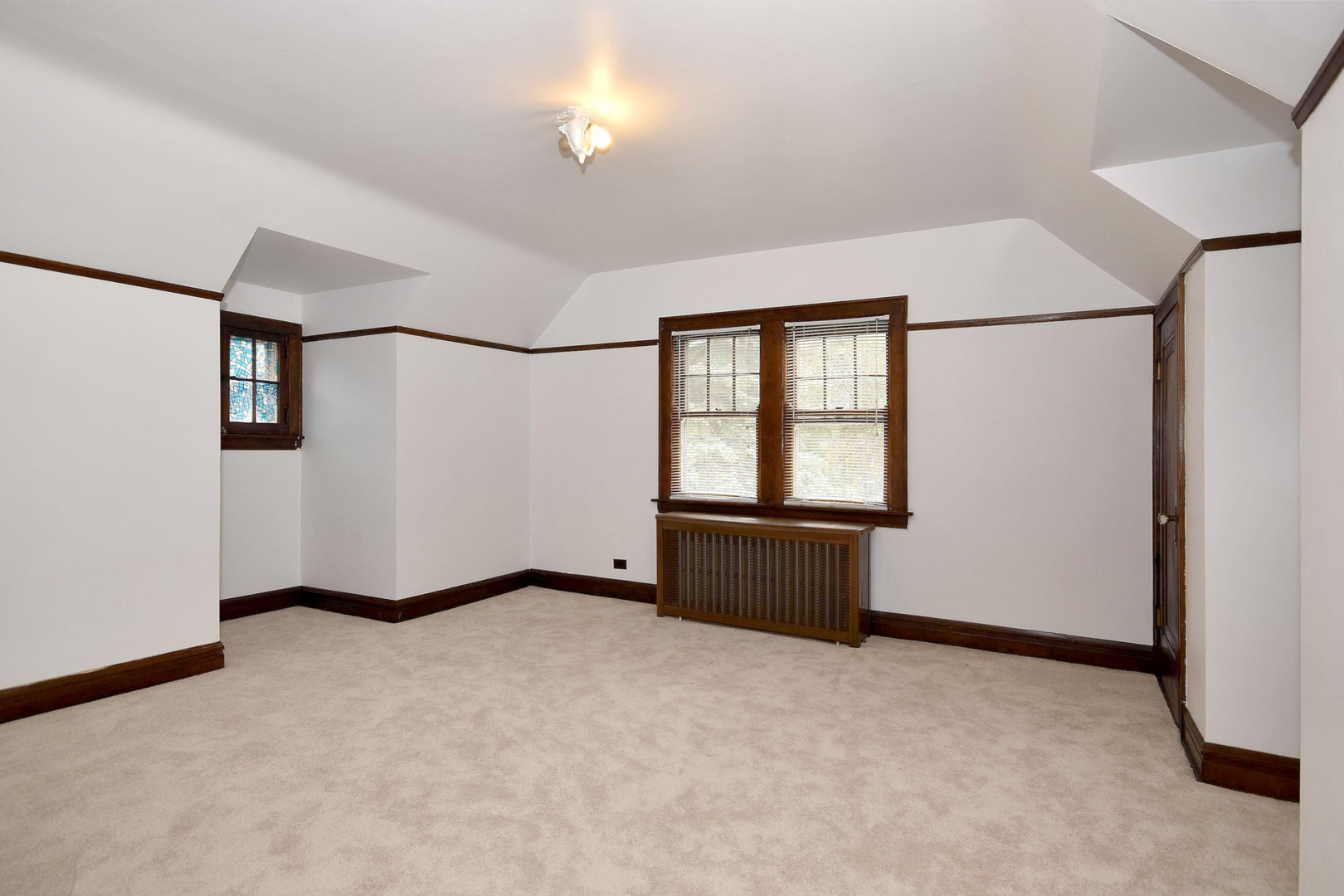 203 Ridgewood Road Riverside, IL 60546 - Photo 8 of 28 an empty room with windows