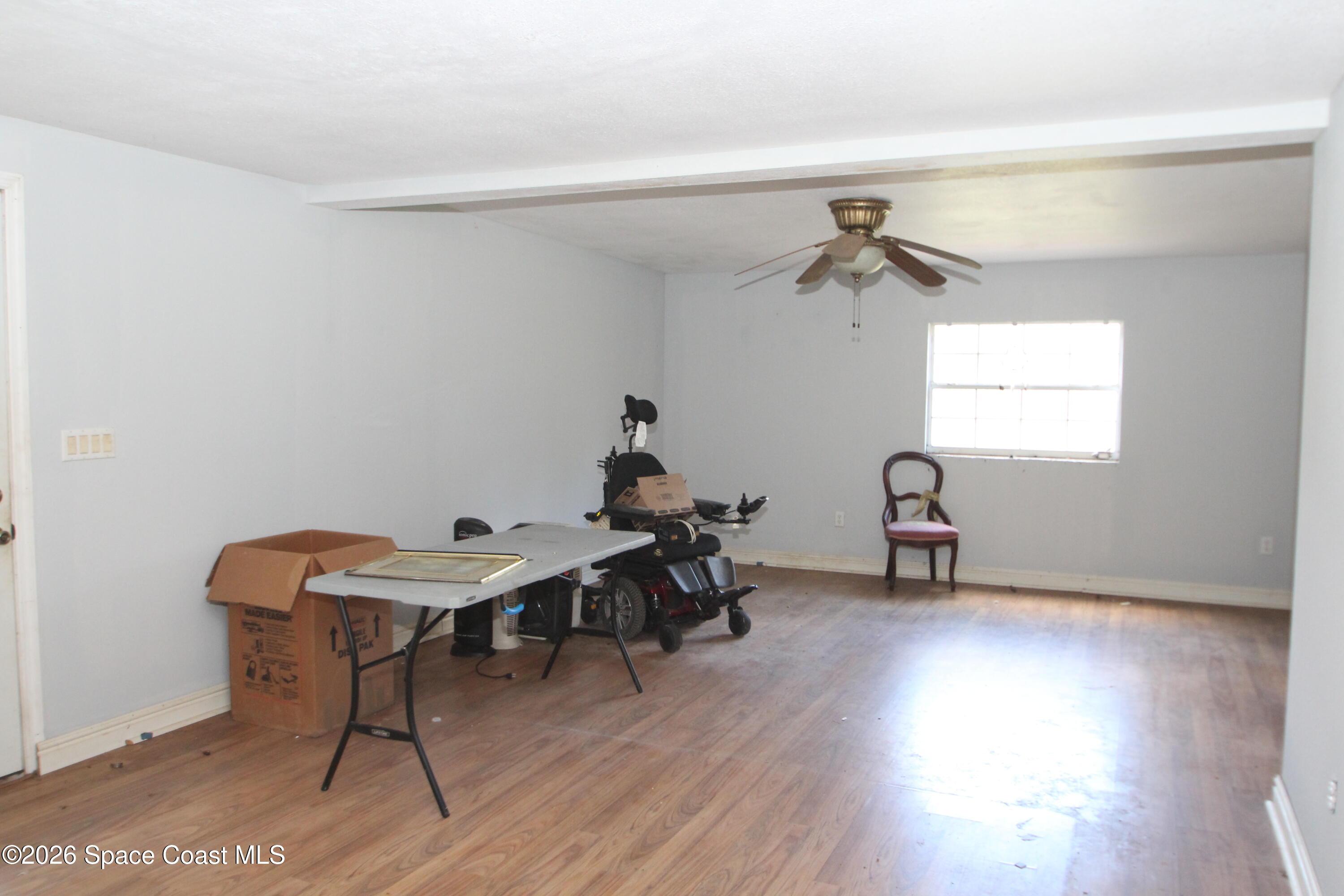 6480 Highway 46 Mims, FL 32754 - Photo 14 of 29 a workspace with wooden floor