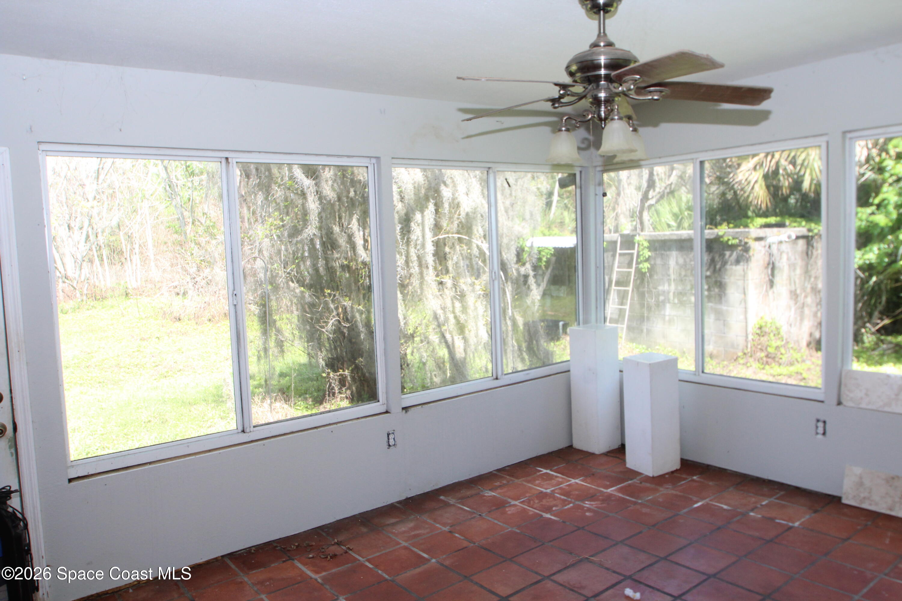 6480 Highway 46 Mims, FL 32754 - Photo 15 of 29 a view of an empty room with a window