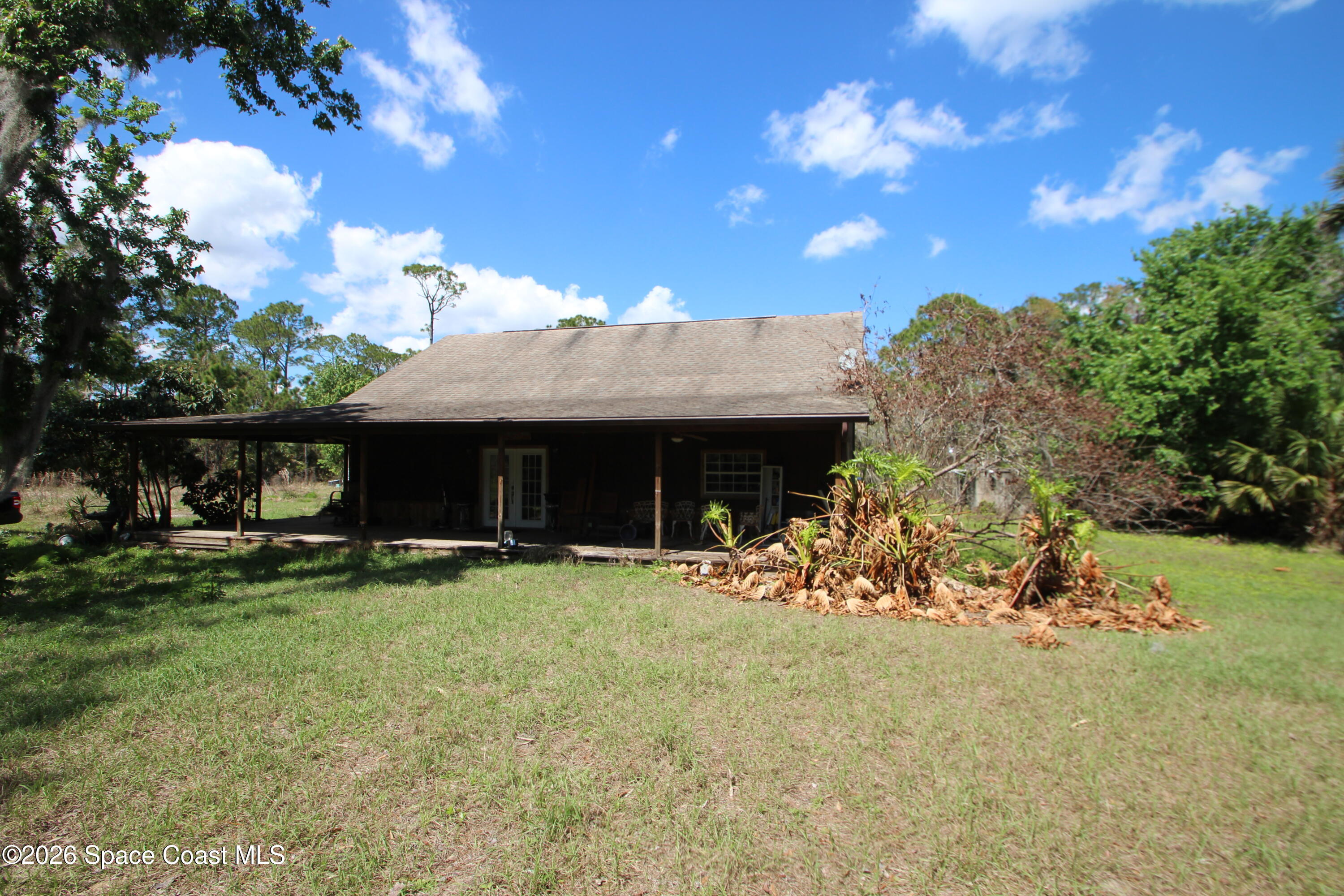 6480 Highway 46 Mims, FL 32754 - Photo 28 of 29 a view of a house with a yard and sitting area