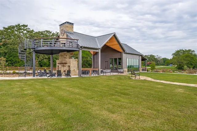 a view of a lake with a yard