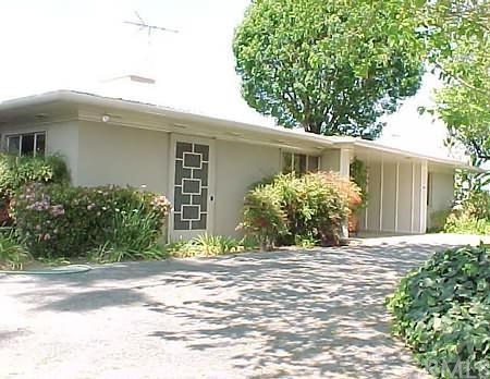 1541 Marion Road Redlands, CA 92374 - Photo 1 of 1 a front view of a house with garden