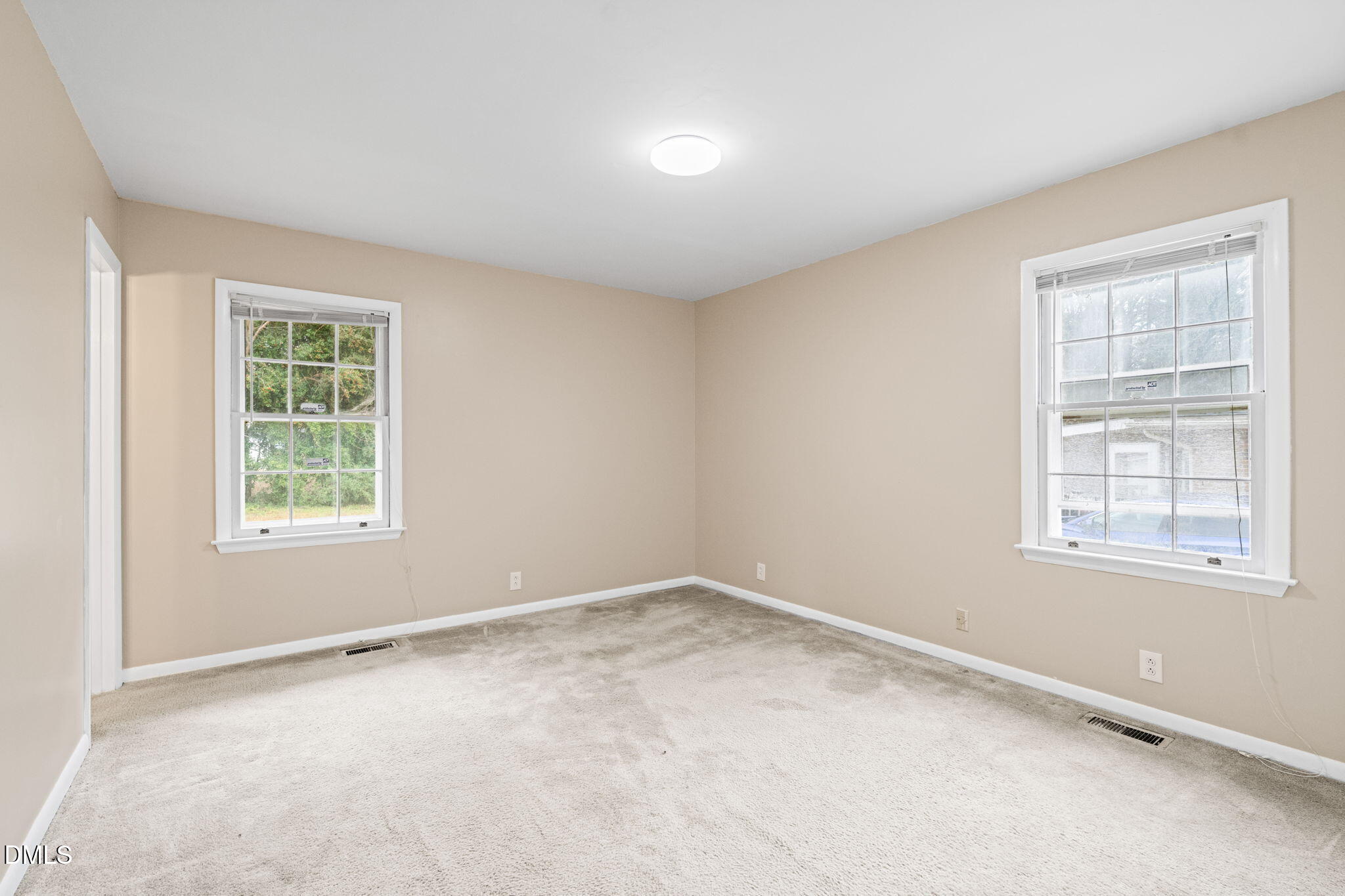 3712 Huntleigh Drive Raleigh, NC 27604 - Photo 14 of 36 an empty room with a window