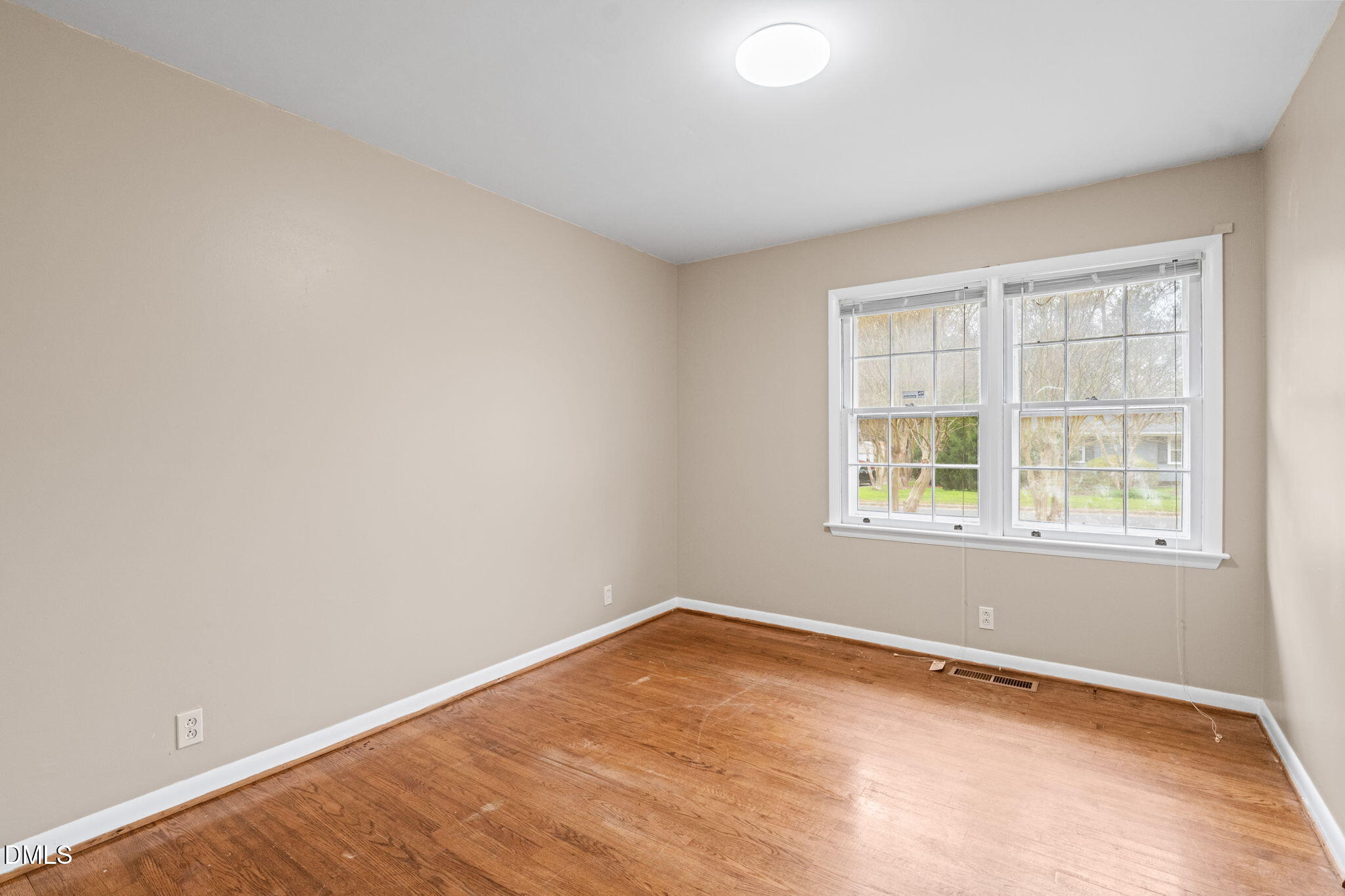 3712 Huntleigh Drive Raleigh, NC 27604 - Photo 25 of 36 an empty room with a window