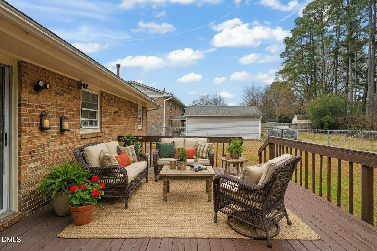 3712 Huntleigh Drive Raleigh, NC 27604 - Photo 30 of 36 a patio with patio couch and potted plants