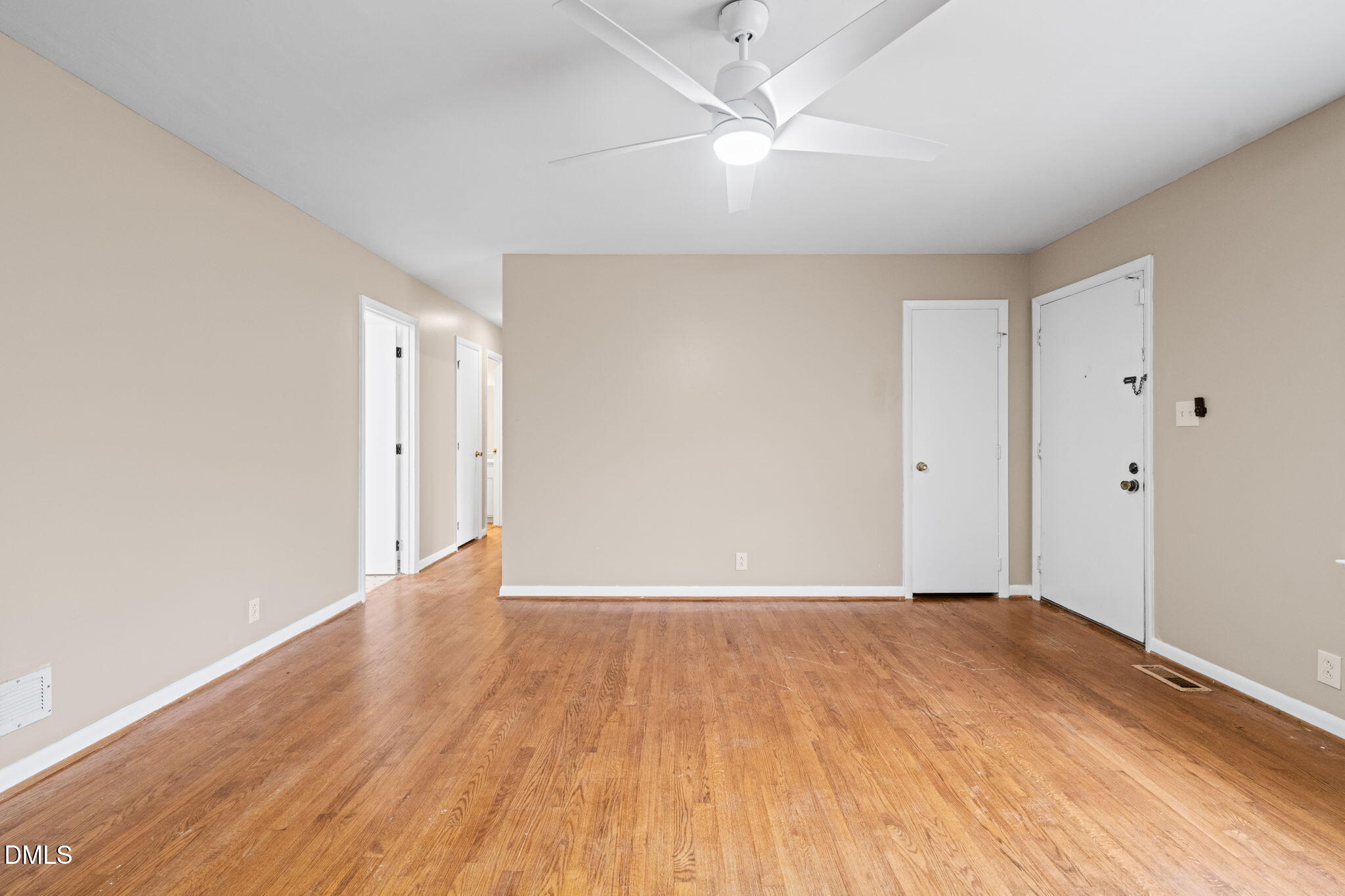 3712 Huntleigh Drive Raleigh, NC 27604 - Photo 5 of 36 a view of an empty room with wooden floor